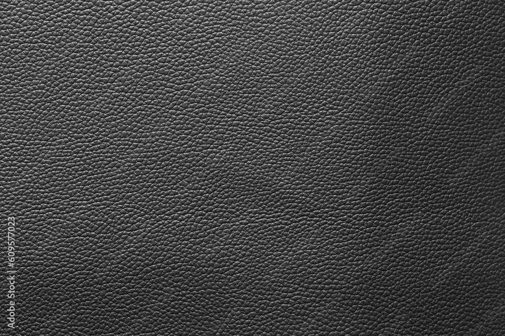 Black leather and a textured background. Black leather and a textured background.