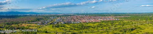 Fototapeta Naklejka Na Ścianę i Meble -  Drone panorama over the outskirts of Frankfurt with the city of Moerfelden-Walldorf and the airport