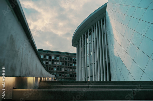 Philharmonie Luxembourg. Steps leading to the rear entrance. Overcast sky with lit steps. Editorial photo. Kirchberg, Luxembourg.