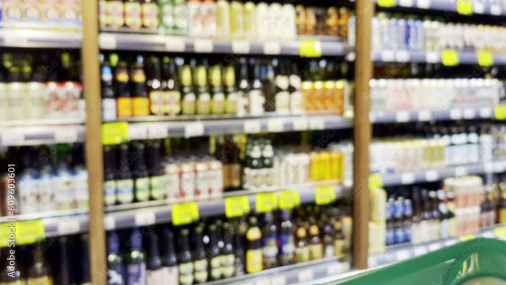 defocused alcohol (wine, champagne, liquor, whiskey) on store shelves defocused alcohol (wine, champagne, liquor, whiskey) on store shelves