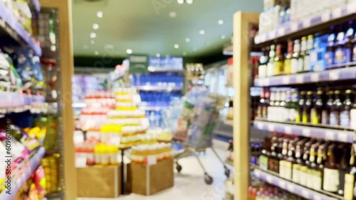 Wallpaper Mural Choosing a dairy products at supermarket.Grocery stores .blurred background Torontodigital.ca