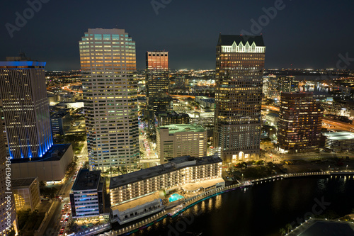 Night urban landscape of downtown district of Tampa city in Florida, USA. Skyline with brightly illuminated high skyscraper buildings in modern american megapolis