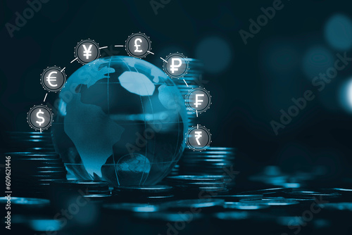 Crystal world and coins stacking with international currency sign include dollar Yen Yuan Euro Pound sterling Ruble Rupee for money transfer and forex exchange concept.