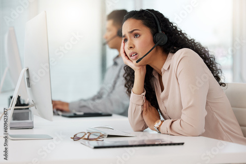 Business woman, call center and frustrated in anxiety, stress or customer service at office. Annoyed female person or consultant agent talking to difficult client or complaint in burnout at workplace