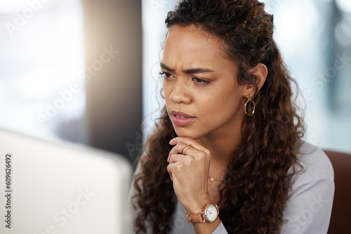 Doubt, confused or woman thinking on computer solution, research or serious job decision or planning. Reading, reviewing business ideas or frustrated analyst for problem solving on digital technology