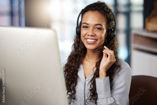 Portrait, telemarketing and woman with customer service, call center and headphones with happiness. Face, female person and happy agent with tech support, computer and consultant with advice and help photo