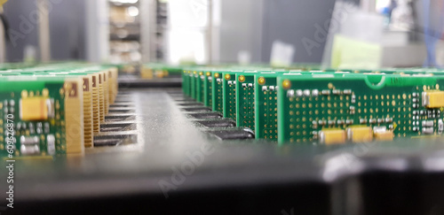 Electronics Manufacturing Services, Assembly Of Circuit Board arrangement, close-up of the raw of PCBA in tray.
