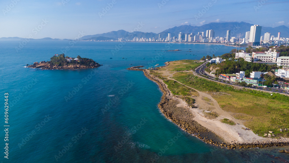 cityscape nha trang city in vietnam shot from drone, gorgeous asia, beach by the sea, modern city in tropics, island with buddhist temple