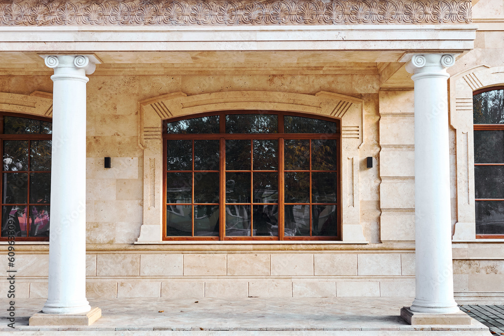 Naklejka premium Building facade made of stacked travertine blocks