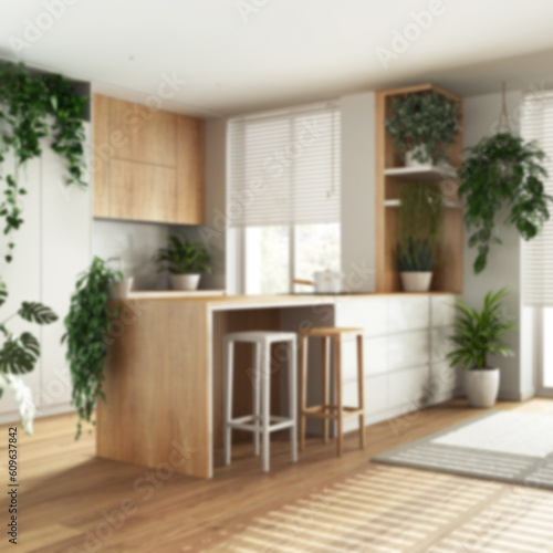 Blurred background, urban jungle interior design, wooden kitchen with many houseplants. Parquet, island with chairs and appliances. Biophilic concept idea © ArchiVIZ