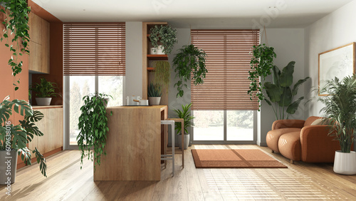 Love for plants concept. Kitchen with island and living room interior design in orange and wooden tones. Parquet, sofa and many house plants. Urban jungle idea