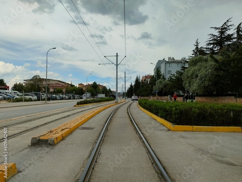 tramvay lines in the city of Eskişehir with a view on the city photo