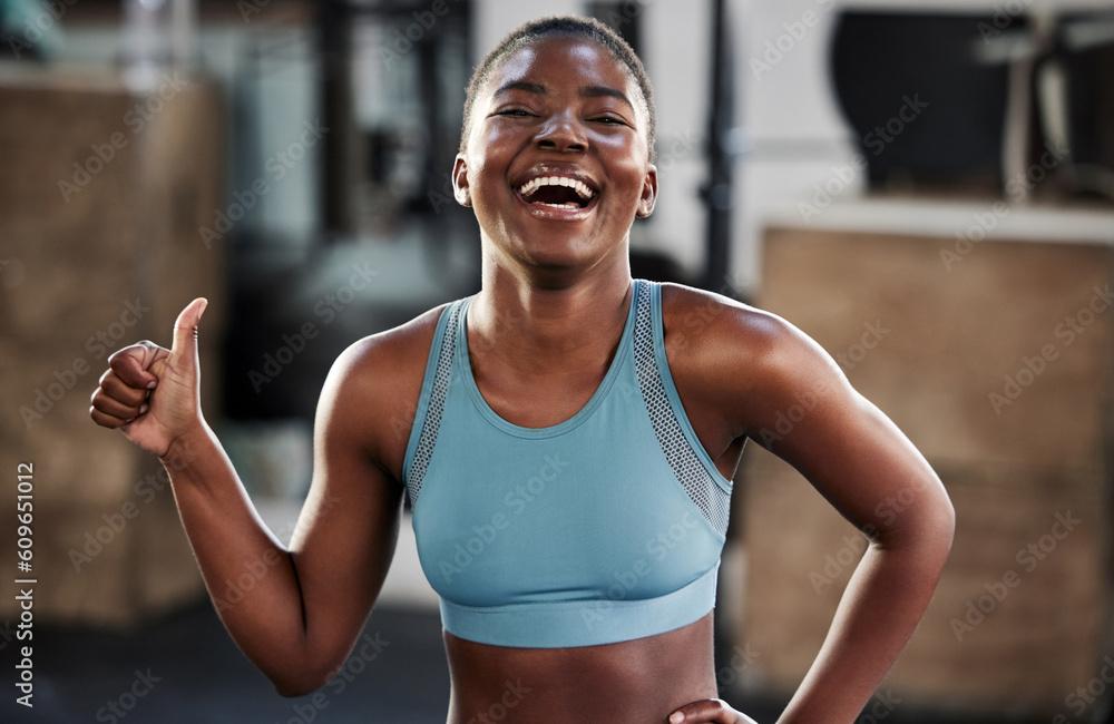 Gym, portrait or happy girl with thumbs up in fitness training with  positive mindset or motivation. Encouragement, workout or excited African  personal trainer with like hand sign, support or thumb up Stock