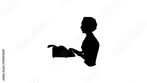 woman typing with old typewriter