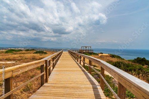 Walkways and viewpoint of Praia do Camilo  on the cliffs of Lagos  Algarve  Portugal.