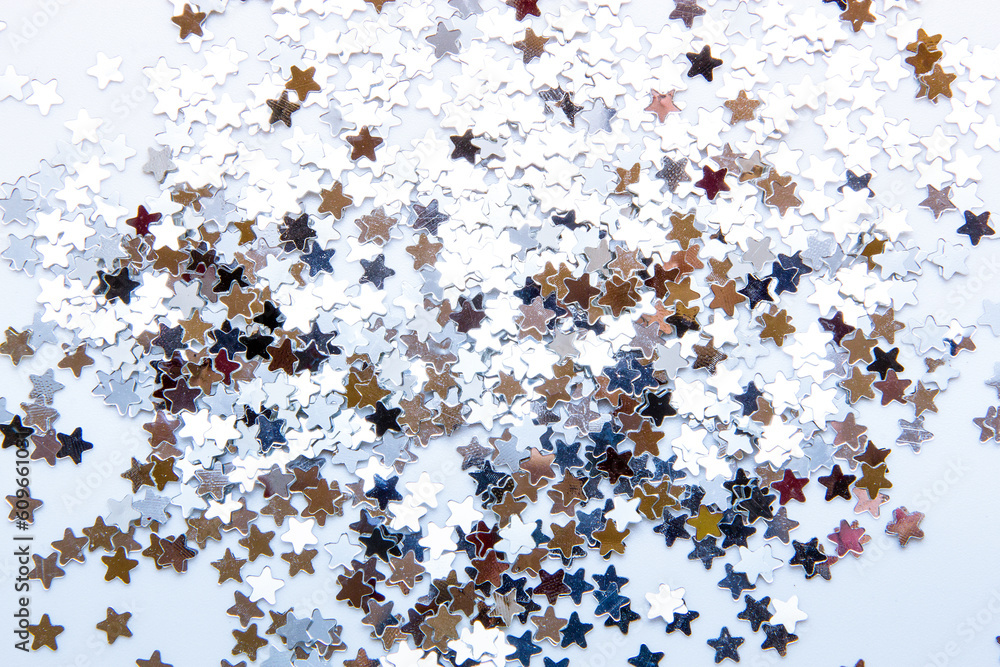 Sequins and glitters on a white background Sequins and glitters on a white background