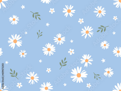 Seamless pattern with daisies and green leaves on blue background vector.