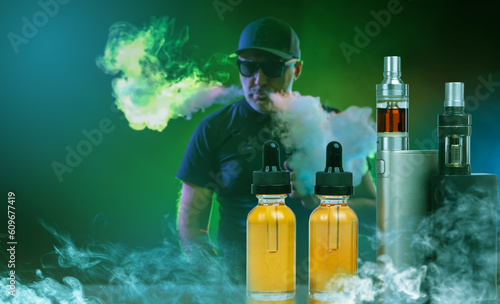 Man smokes vape. Oil for re...