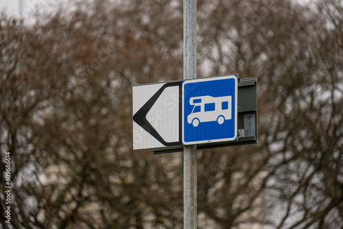 M?lndal, Sweden - January 29 2023: Sign pointing to a parking space for recreational vehicles. photo