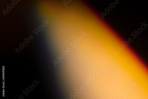 analogic light leak produced with glass crystal and led lights, background is pure black. Perfect for overlays.