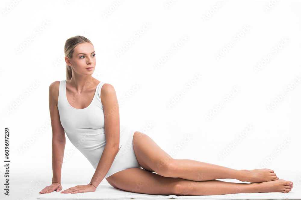 Fototapeta premium Woman sitting in white underwear