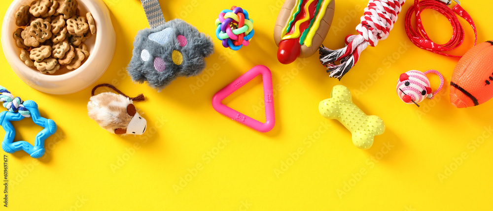 Pet shop banner design. Flat lay cat and dog toys and accessories on color background.