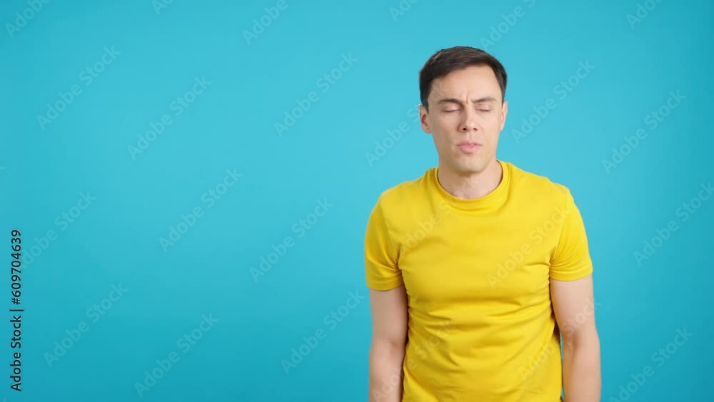 Angry man pointing to the blank space aside Angry man pointing to the blank space aside