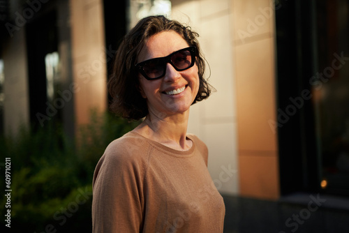 Melancholic beautiful portrait profile. Young adult in the sunglasses. Romantic affecting mood. High quality photo