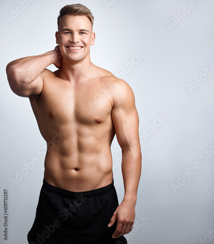 Portrait, happy man and bodybuilder with abs on studio background, backdrop and topless pride on mockup. Strong male model, sexy sports athlete and smile for fitness, personal trainer and confidence