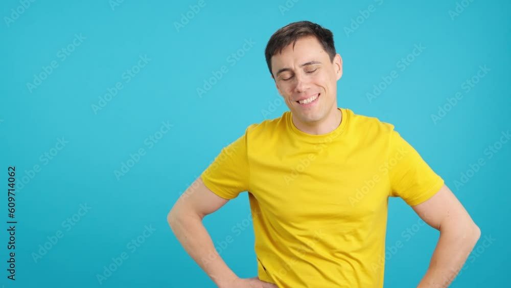 Man greeting someone while raising a thumb up and clapping Man greeting someone while raising a thumb up and clapping