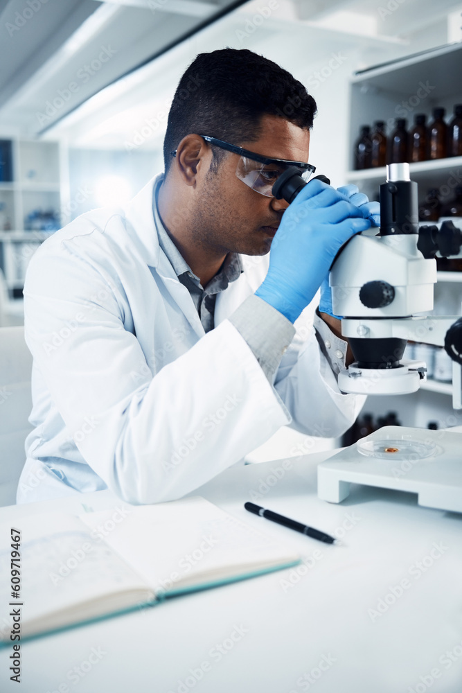 Man, scientist and microscope, analysis in laboratory and check DNA sample with science experiment. Male doctor analyze data in lab, scientific innovation for development and medical research Man, scientist and microscope, analysis in laboratory and check DNA sample with science experiment. Male doctor analyze data in lab, scientific innovation for development and medical research