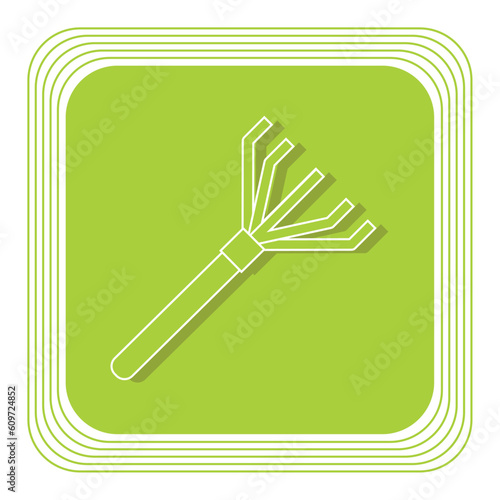 vector icon of a grass rake with green background photo