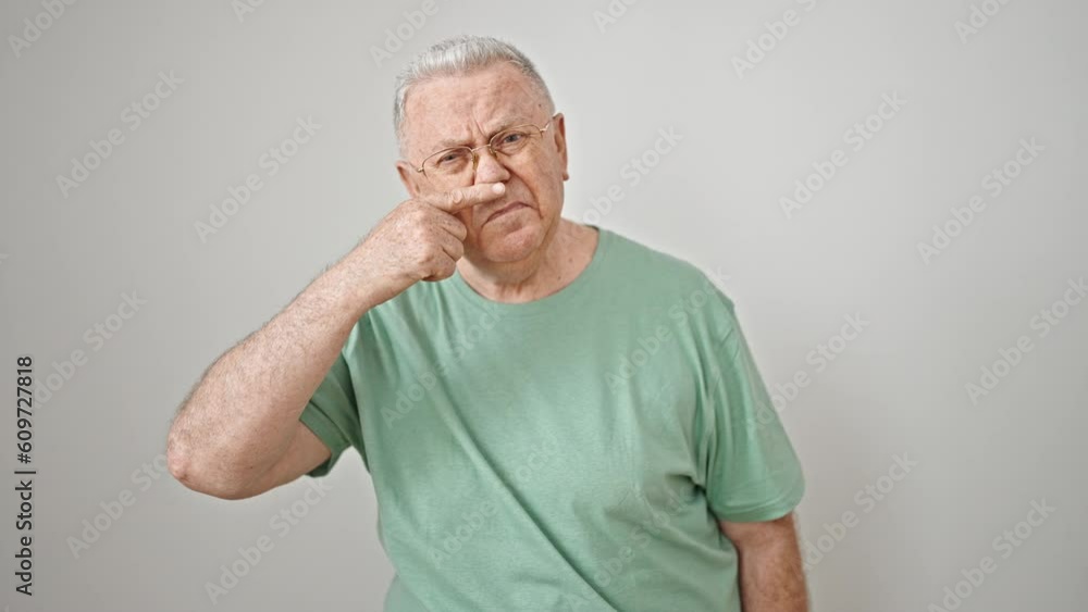 Middle age grey-haired man sneezing over isolated white background Middle age grey-haired man sneezing over isolated white background