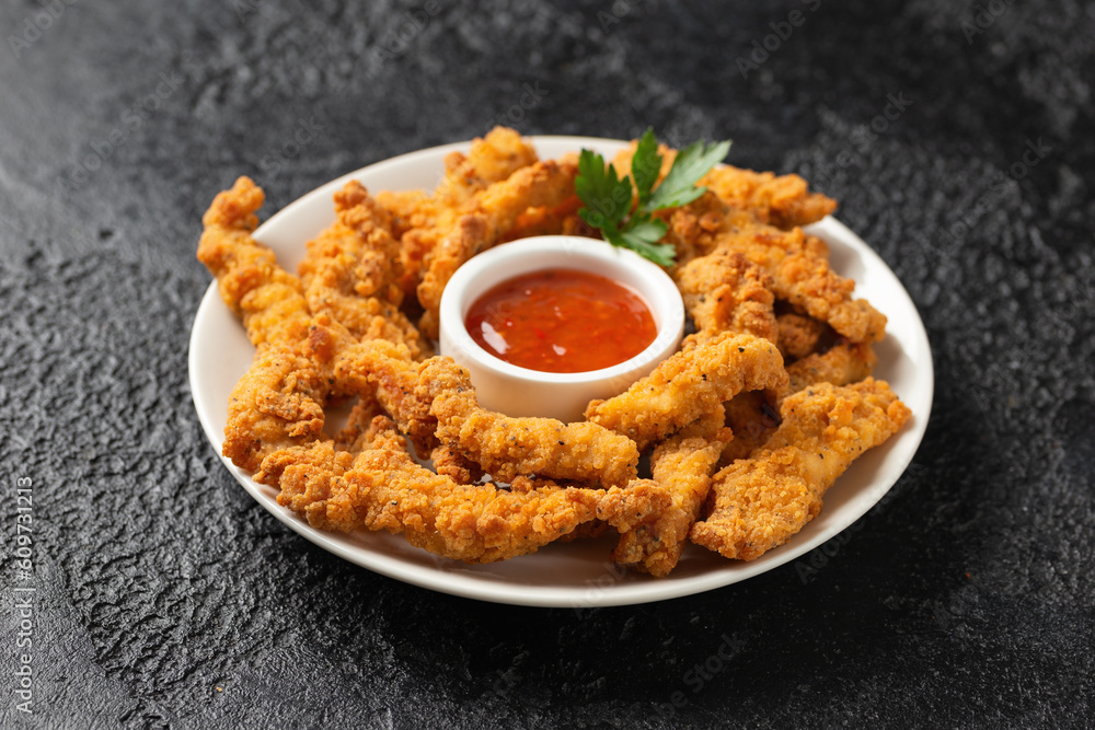 Crispy Shredded Chicken served with sweet chilli sauce. Party finger food snack concept Crispy Shredded Chicken served with sweet chilli sauce. Party finger food snack concept