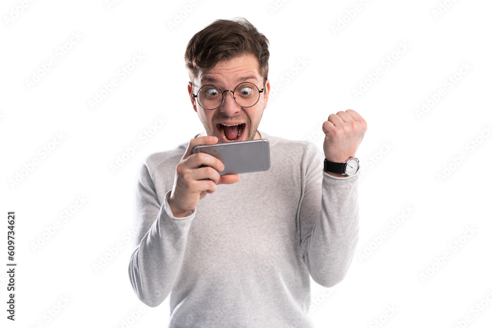 Happy man holding smartphone and celebrating his success over transparent background Happy man holding smartphone and celebrating his success over transparent background