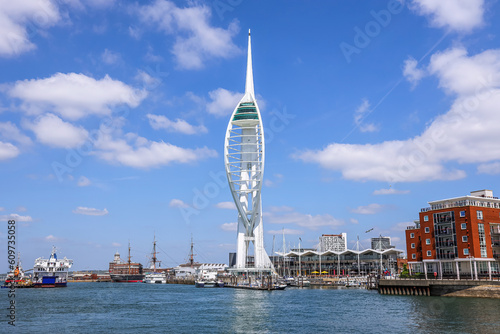 The Spinnaker tower at the harbor of Portsmouth. The Spinnaker Tower is a landmark observation tower in Portsmouth, England.
