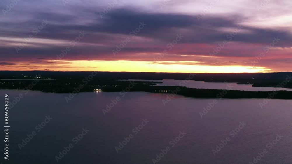 Lake Macquarie murrays beach at sunset in 4k aerial time lapse. Lake Macquarie murrays beach at sunset in 4k aerial time lapse.