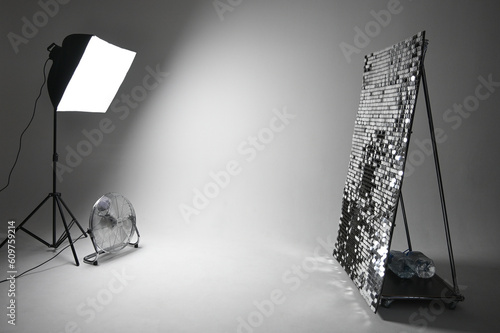 Studio with cyclorama and equipment. Interior of modern photostudio with ventilator professional equipment