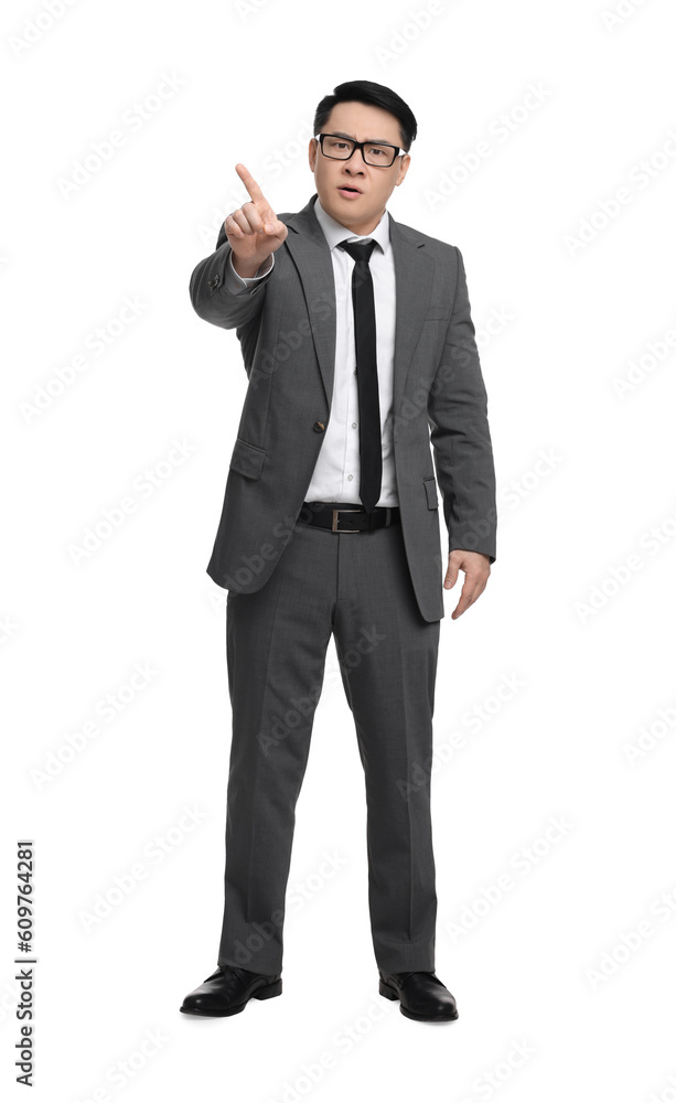 Angry businessman in suit wearing glasses on white background
