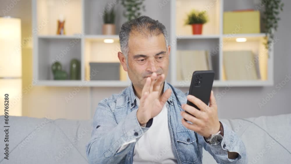 The man who can't use the app on the phone.