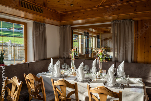 Decorated Gala dinner table with wine glasses and decorative napkins for a wedding