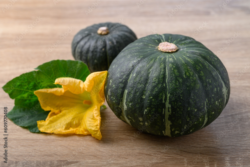 Green pumpkin on wooden background, Organic vegetable Green pumpkin on wooden background, Organic vegetable
