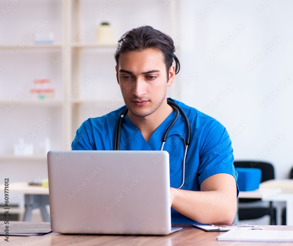 Young male doctor in telehealth concept Young male doctor in telehealth concept