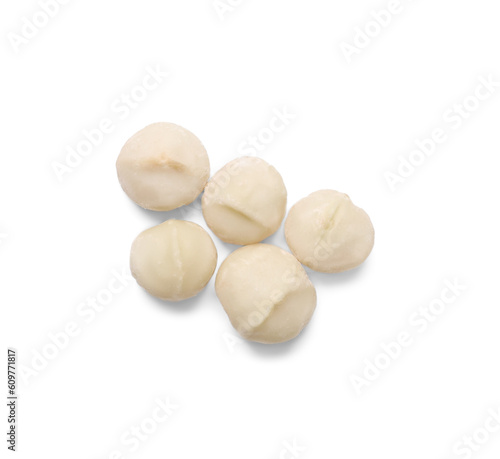 Delicious shelled Macadamia nuts isolated on white, top view