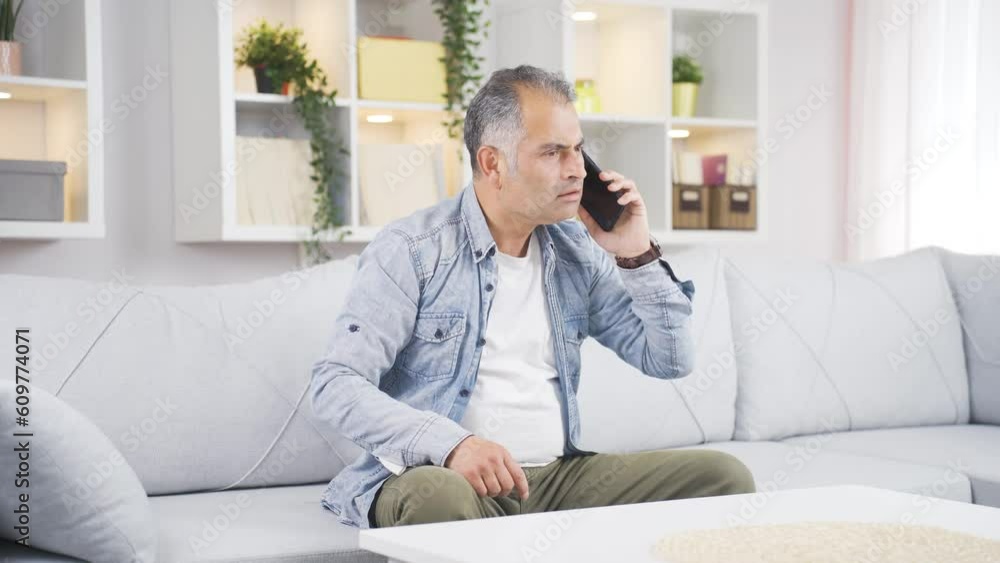 The man having a separation argument on the phone. The man having a separation argument on the phone.