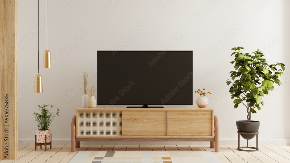 Living room with a white wall background, enhanced by the presence of a beautifully mounted TV. 3d rendering Living room with a white wall background, enhanced by the presence of a beautifully mounted TV. 3d rendering