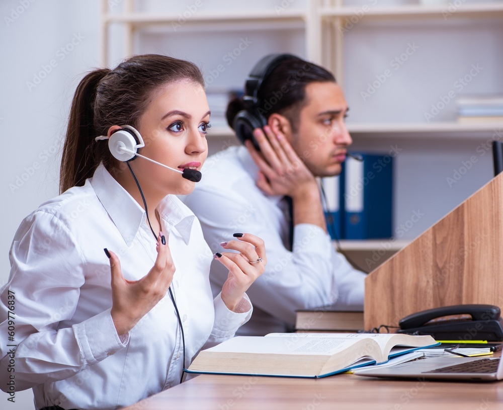Call center operators working in the office