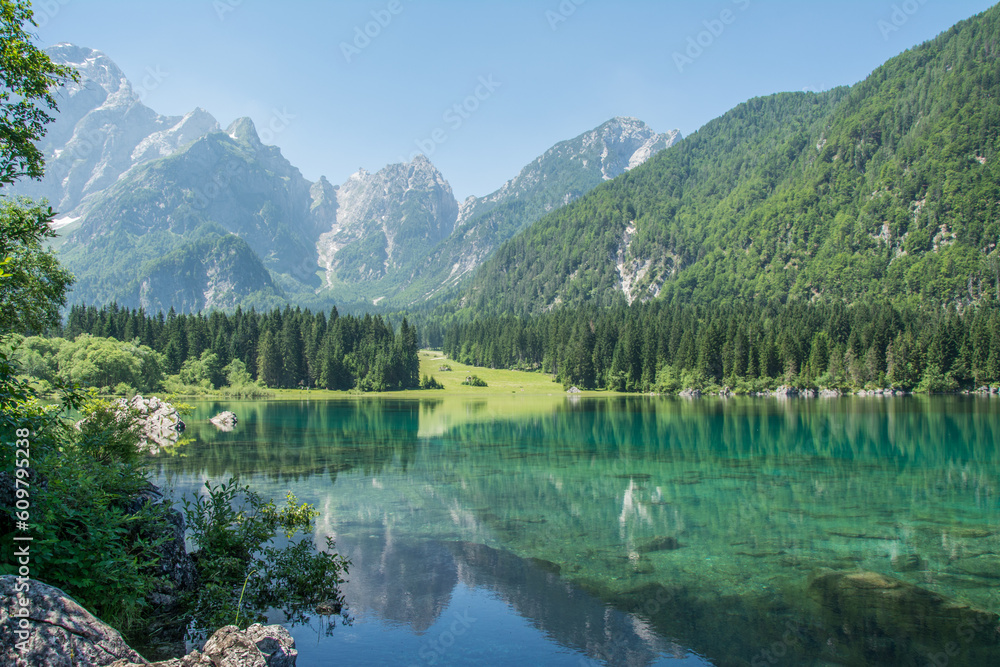 View of Lago di Fusine, Italy, Europe.  Reflection of the mountains in a lake. 