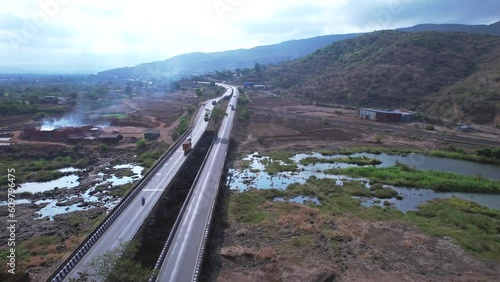 Aerial view of the old Bombay to Poona highway at Kamshet near Pune India. This highway is officially known as NH48. photo