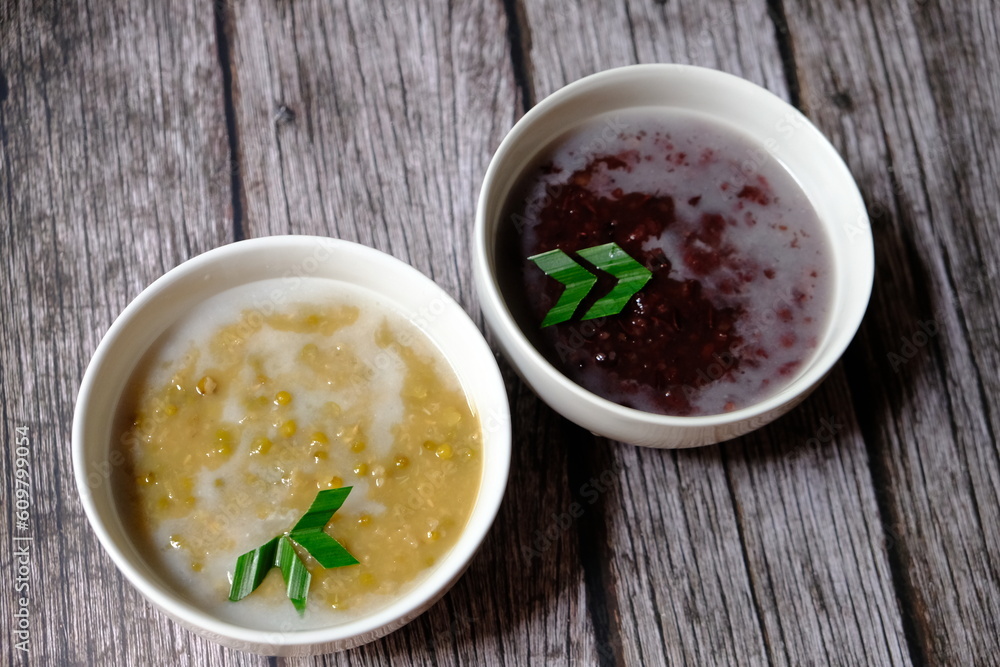 Bubur Kacang Ijo and Bubur Ketan Hitam, mung bean and black rice porridge with coconut milk are famous meal in Indonesia. These traditional food can be found everywhere in Indonesia. Bubur Kacang Ijo and Bubur Ketan Hitam, mung bean and black rice porridge with coconut milk are famous meal in Indonesia. These traditional food can be found everywhere in Indonesia.